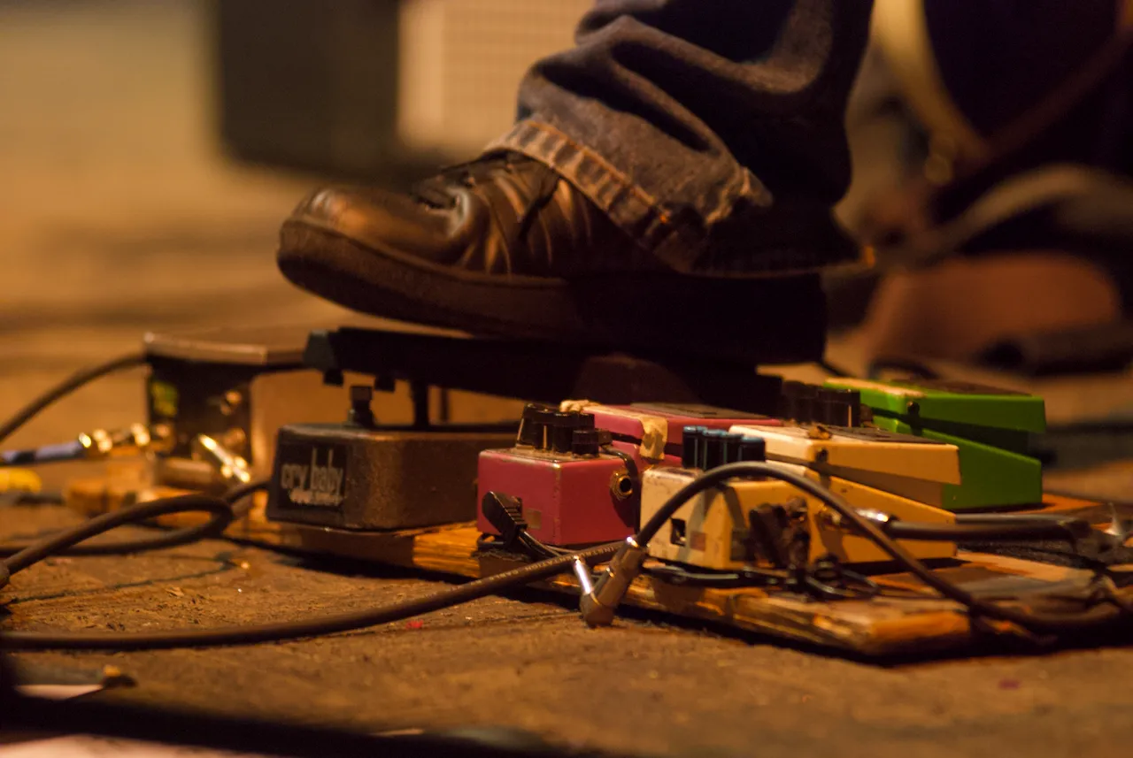 Guitar pedals on stage